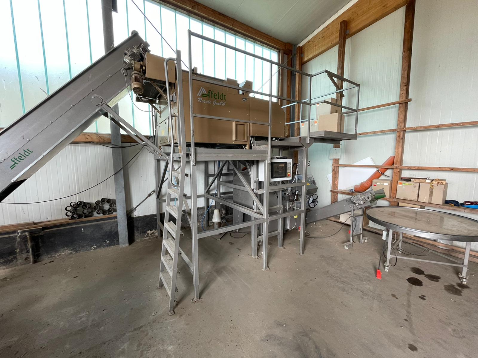 Affeldt weighing machine with C-Pack net clipper