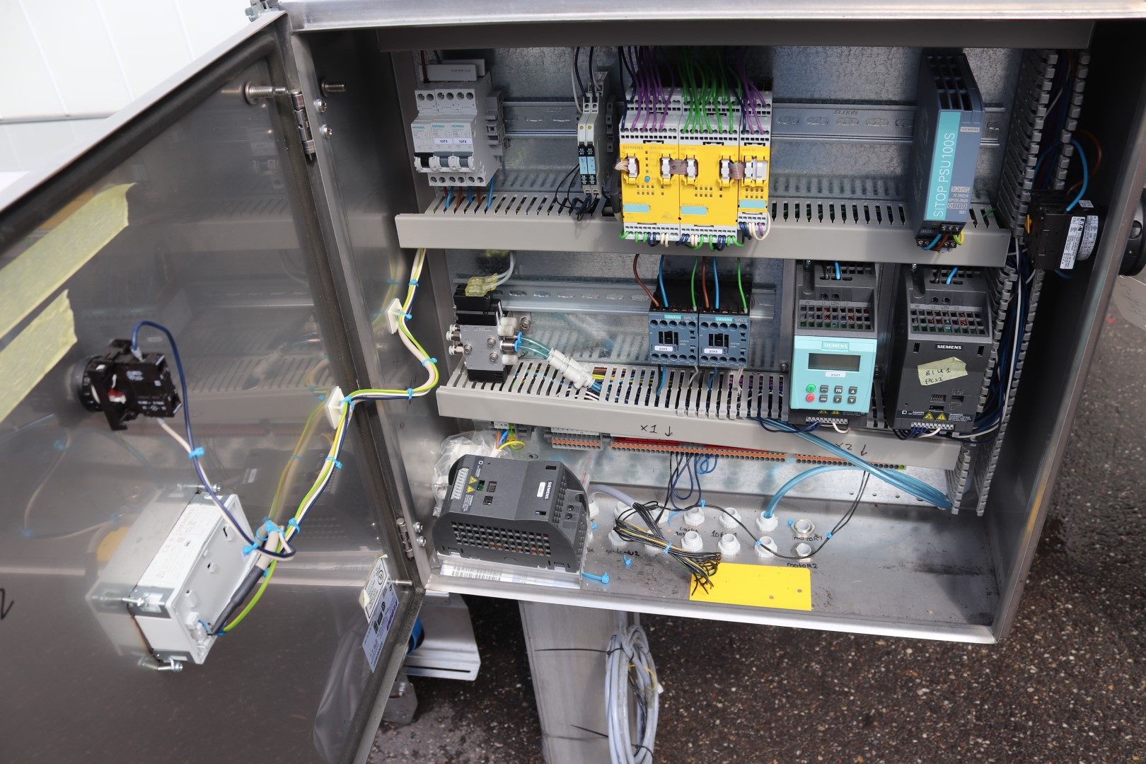 Newtec 14-head weighing machine with supply conveyors
