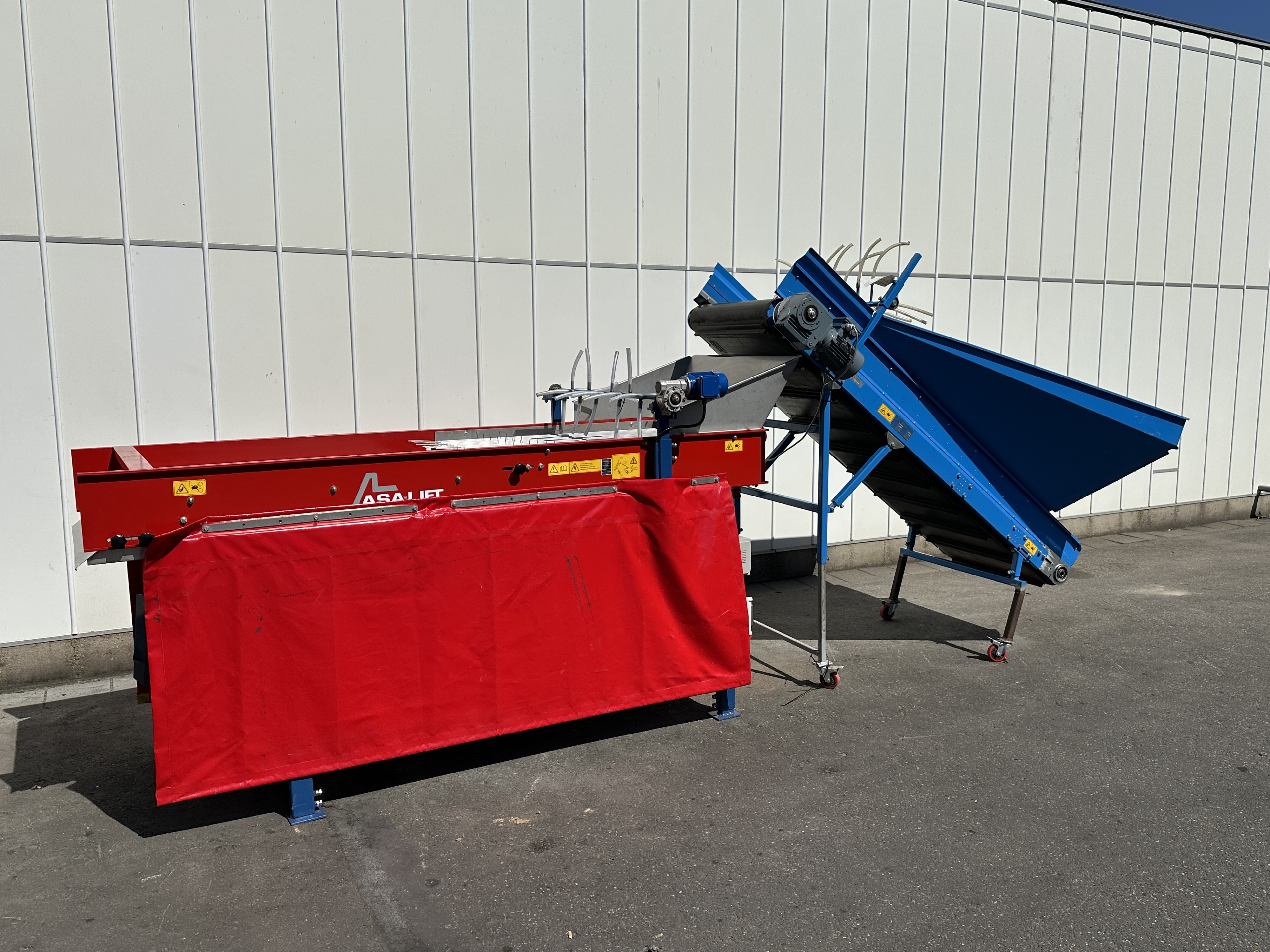 Asa-Lift BS-100 Машинa для сортировки по длине с бункером для корма и поперечным разгрузочным конвейером.