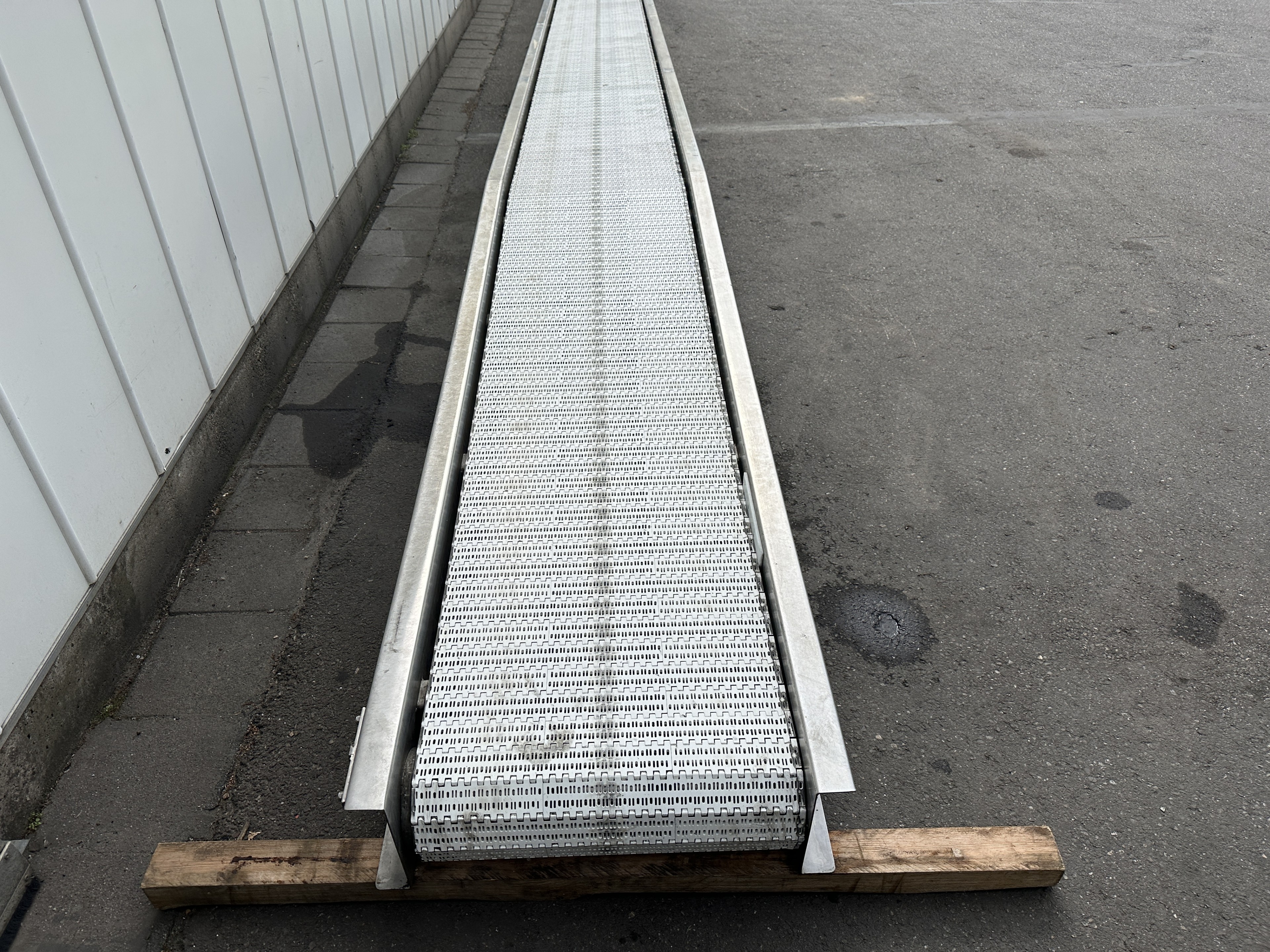 Verbruggen конвейер 1250 x 60 см с поперечным конвейером 100 x 40 см, оба из нержавеющей стали.