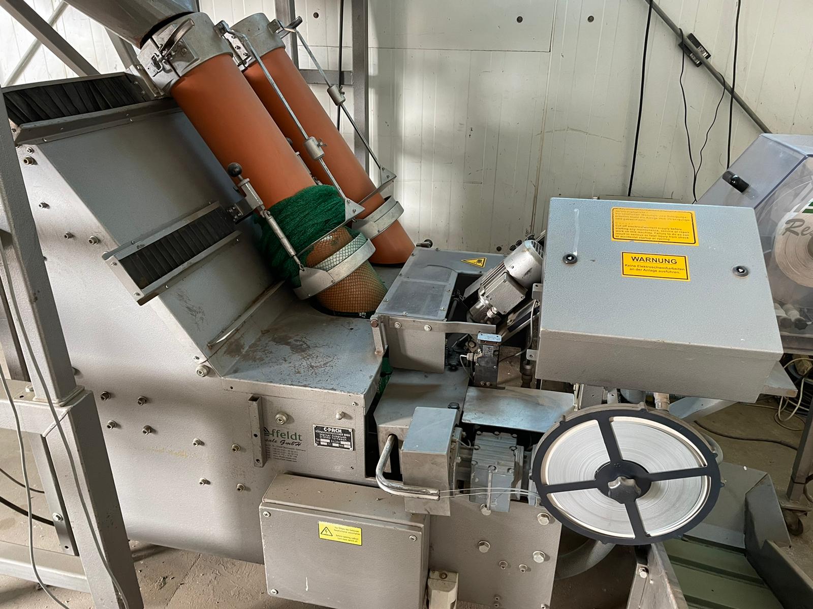 Affeldt weighing machine with C-Pack net clipper