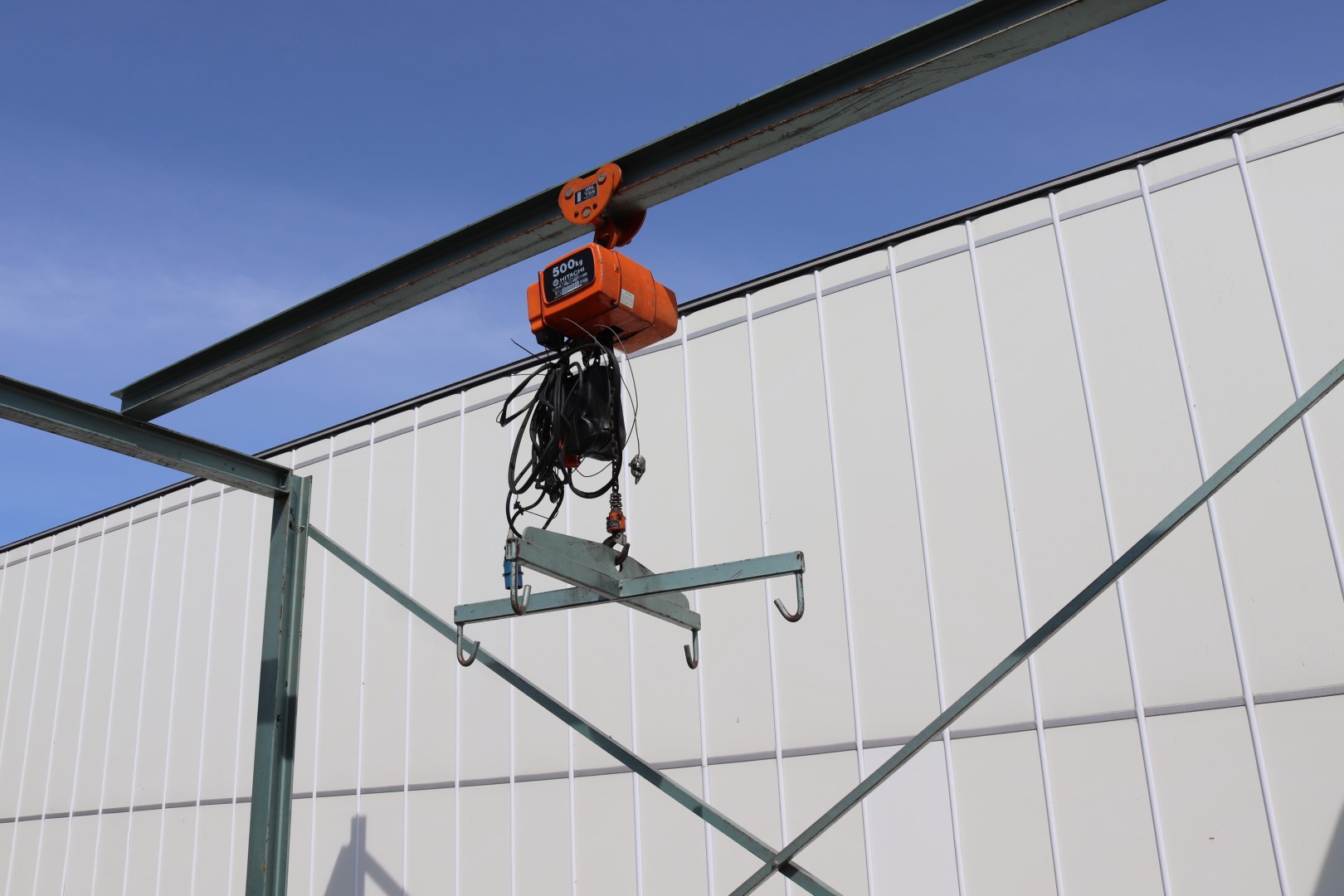 Electrical hoist with frame