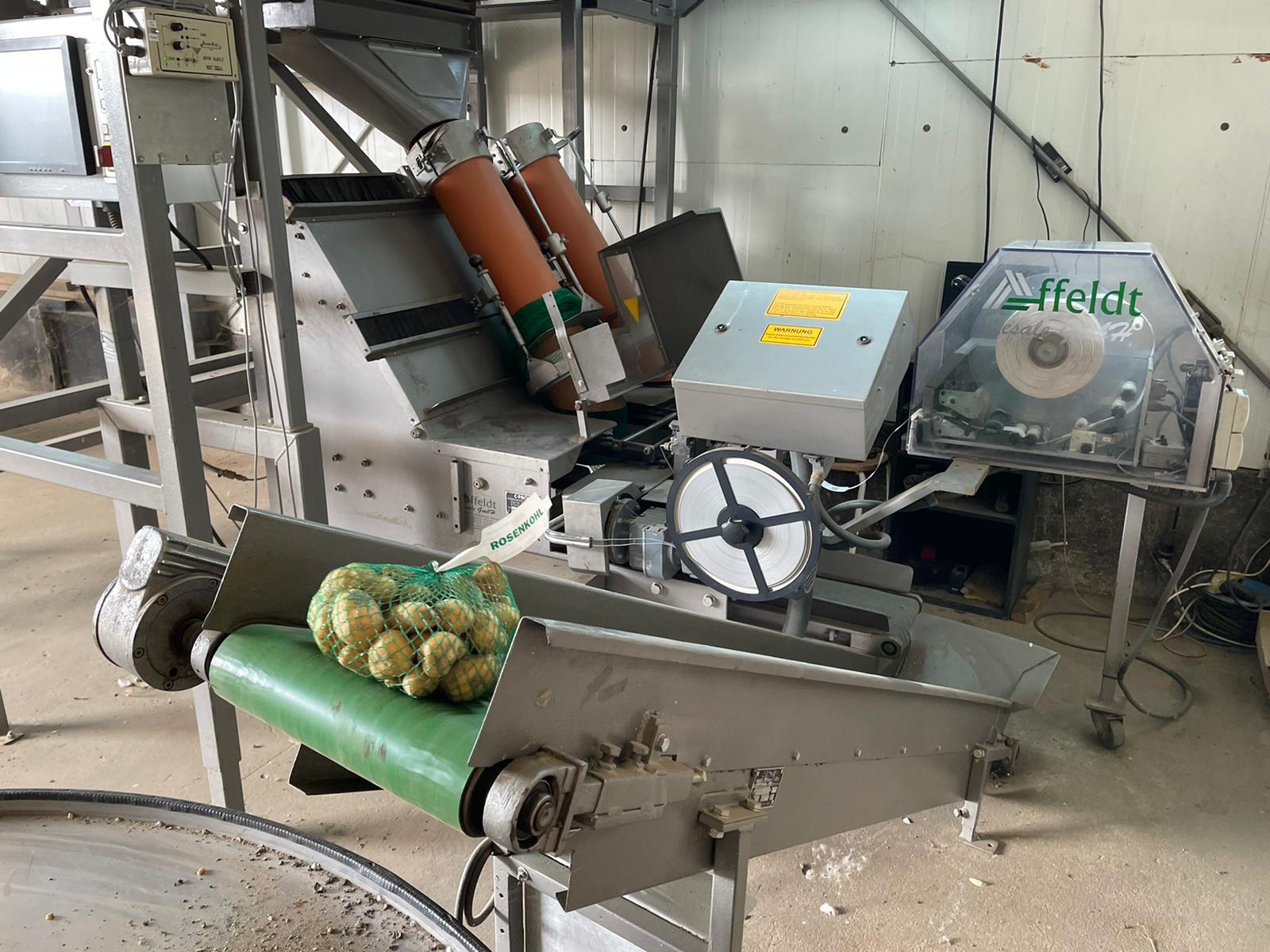 Affeldt weighing machine with C-Pack net clipper
