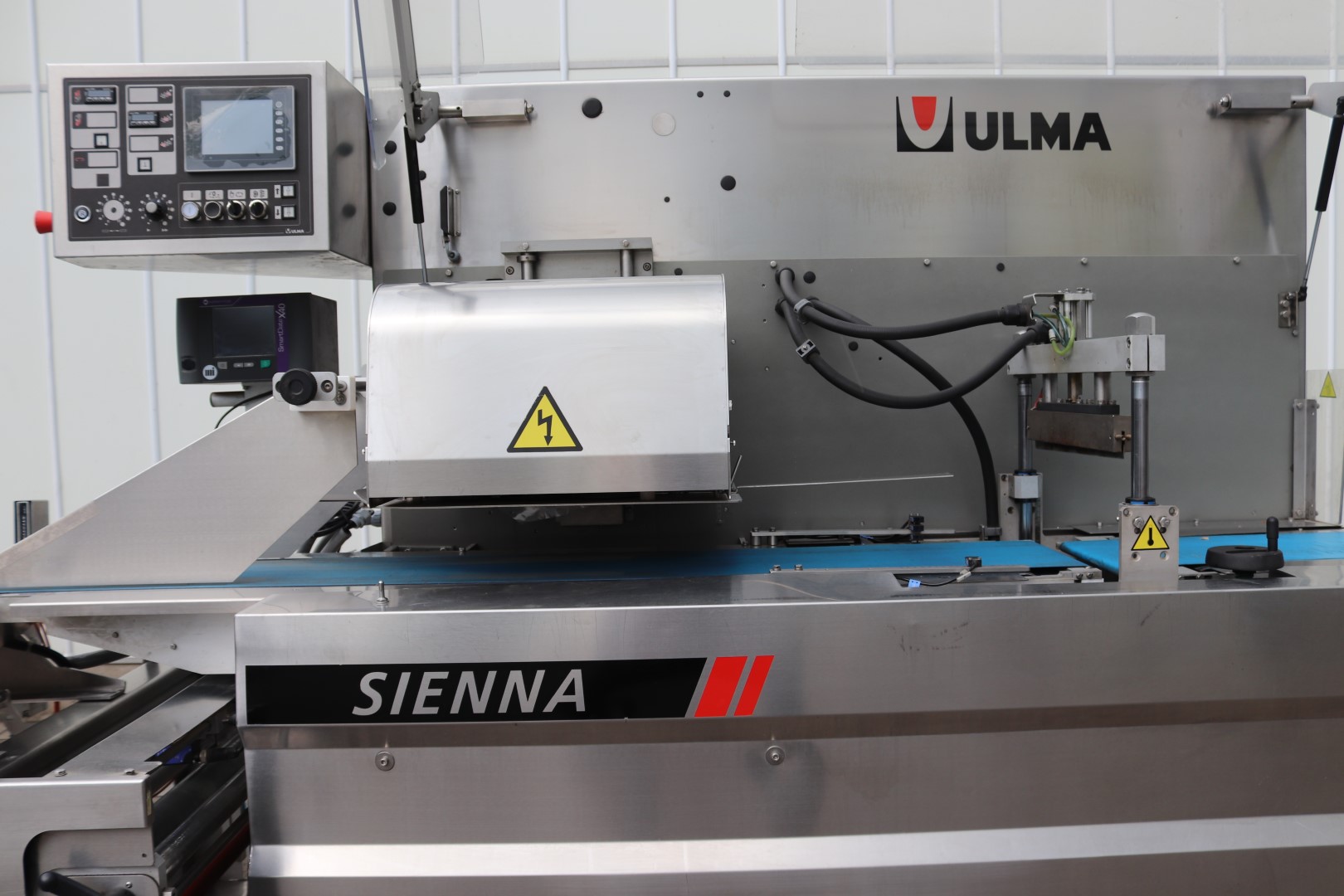 Флоупакер Ulma Sienna LS с принтером Markem Imaje SmartDate X40