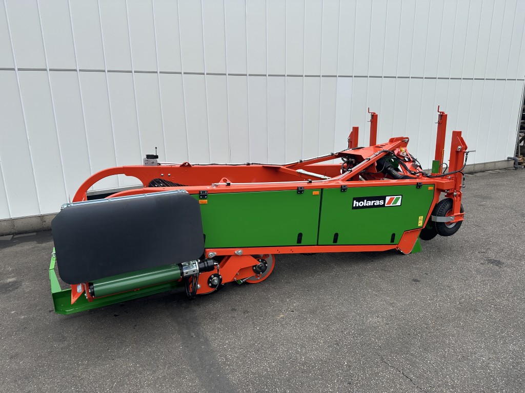 Holaras UR 135-DB Лукоуборочный комбайн с поперечными конвейерными лентами