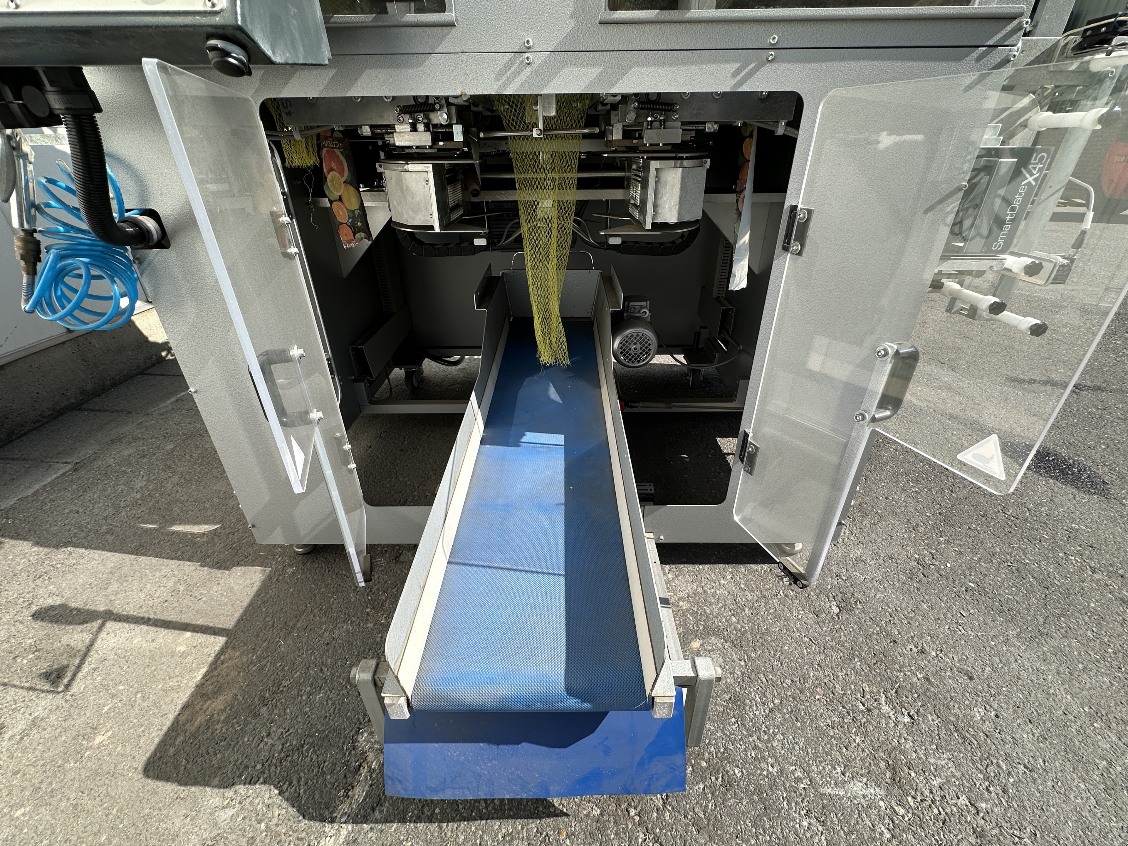 C-Pack VAS 992 Вертикальная упаковочная машина, машина для упаковки сетки с запечатыванием и ручкой.