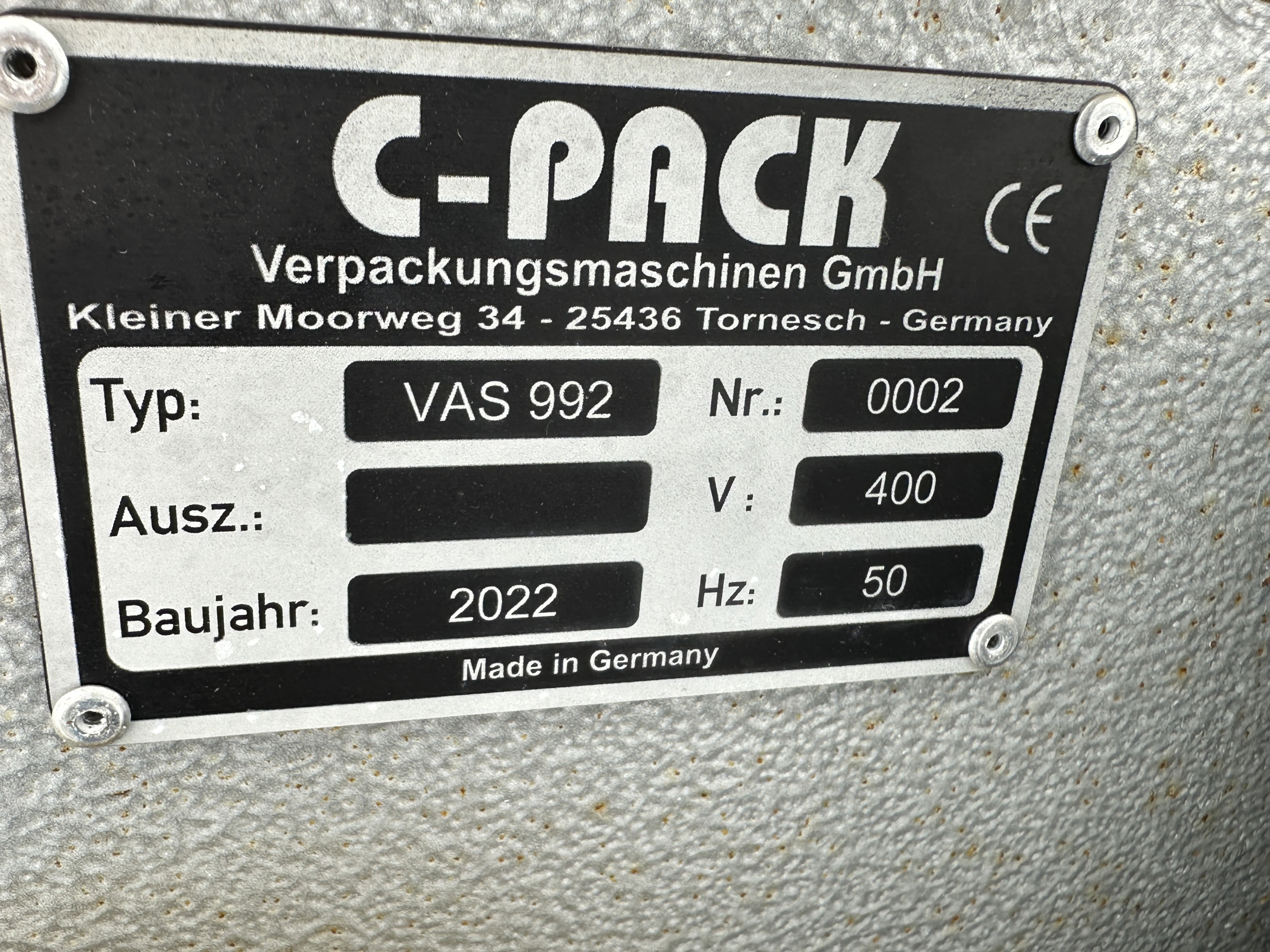C-Pack VAS 992 Вертикальная упаковочная машина, машина для упаковки сетки с запечатыванием и ручкой.