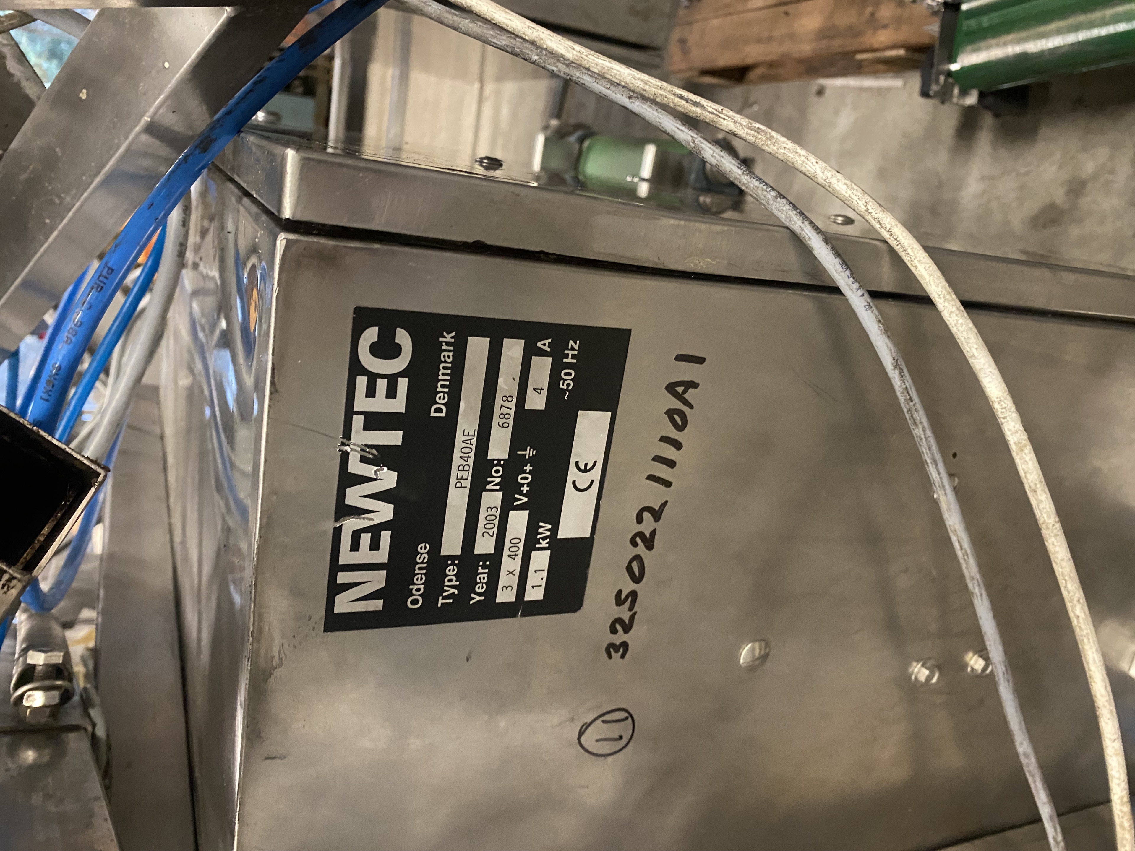 Машина для упаковки в пакеты Newtec PEB AE40