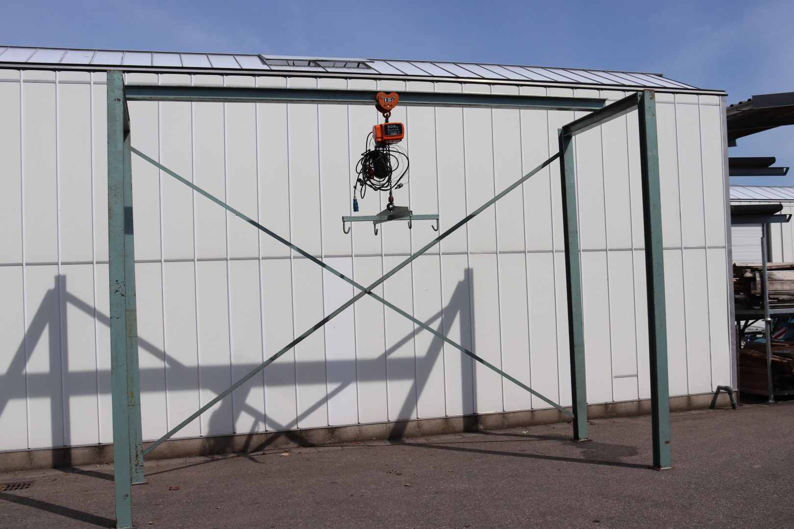 Electrical hoist with frame