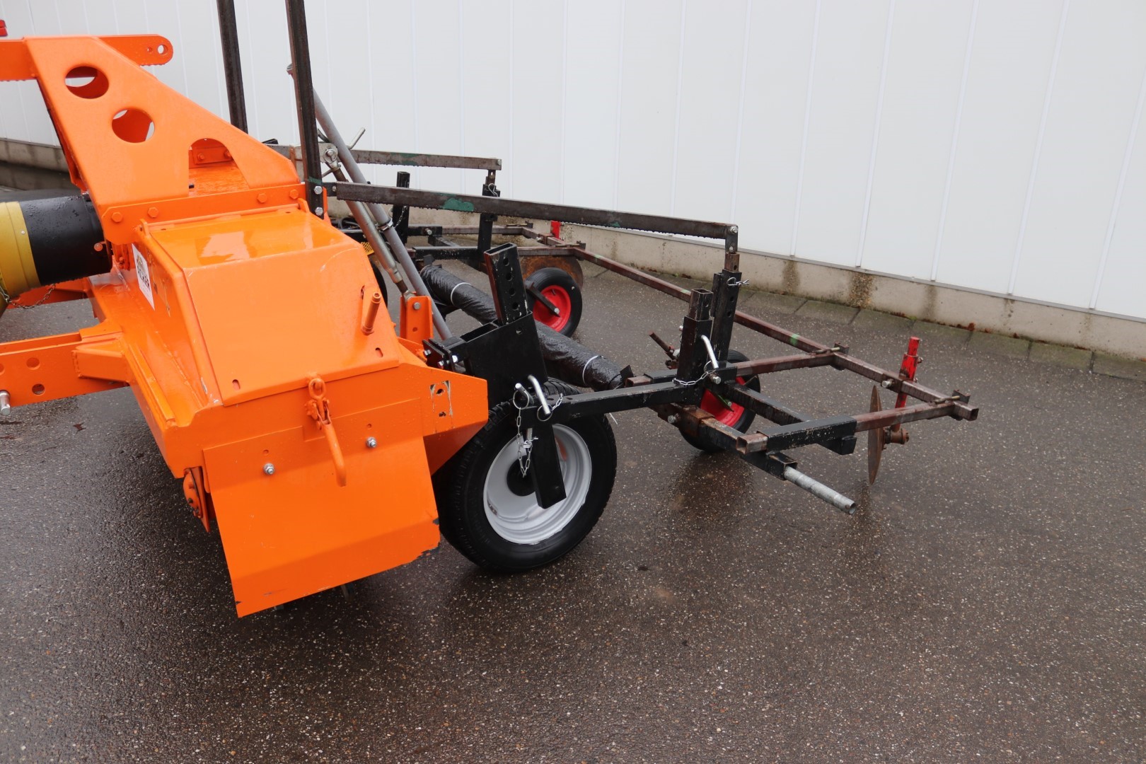 Acker SPR-GN hill former with foil / plastic laying machine