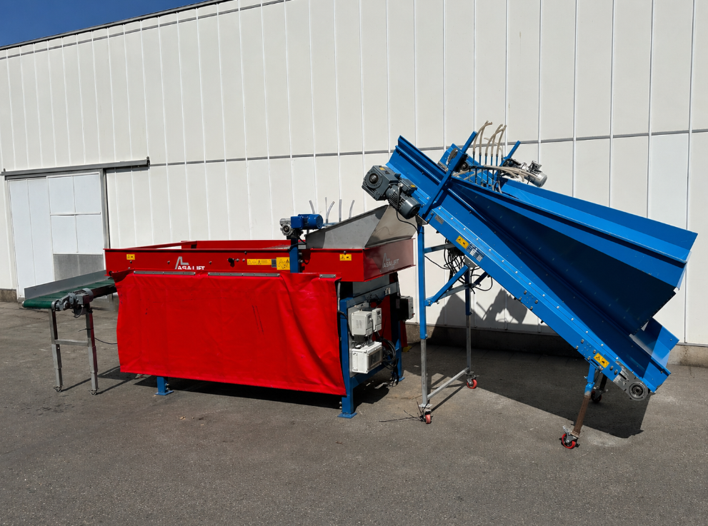 Asa-Lift BS-100 Машинa для сортировки по длине с бункером для корма и поперечным разгрузочным конвейером.